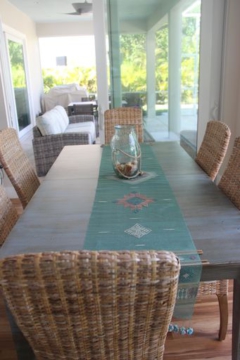 Light-filled dining area was formerly a standard “Florida room”