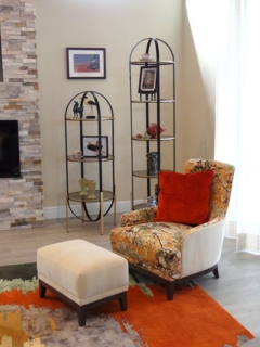 Living-room furniture in dramatic color scheme with custom-designed rug